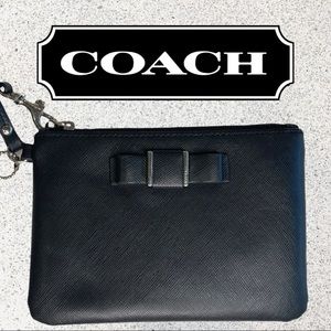 Adorable Coach leather bow wristlet